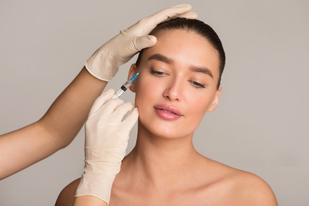 woman getting injectable treatment