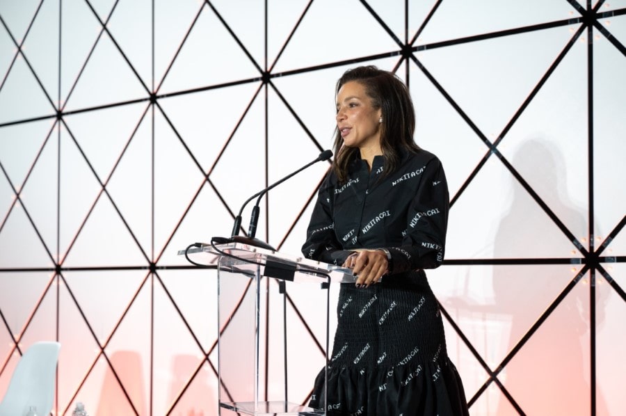 Dr. Z speaking at a podium