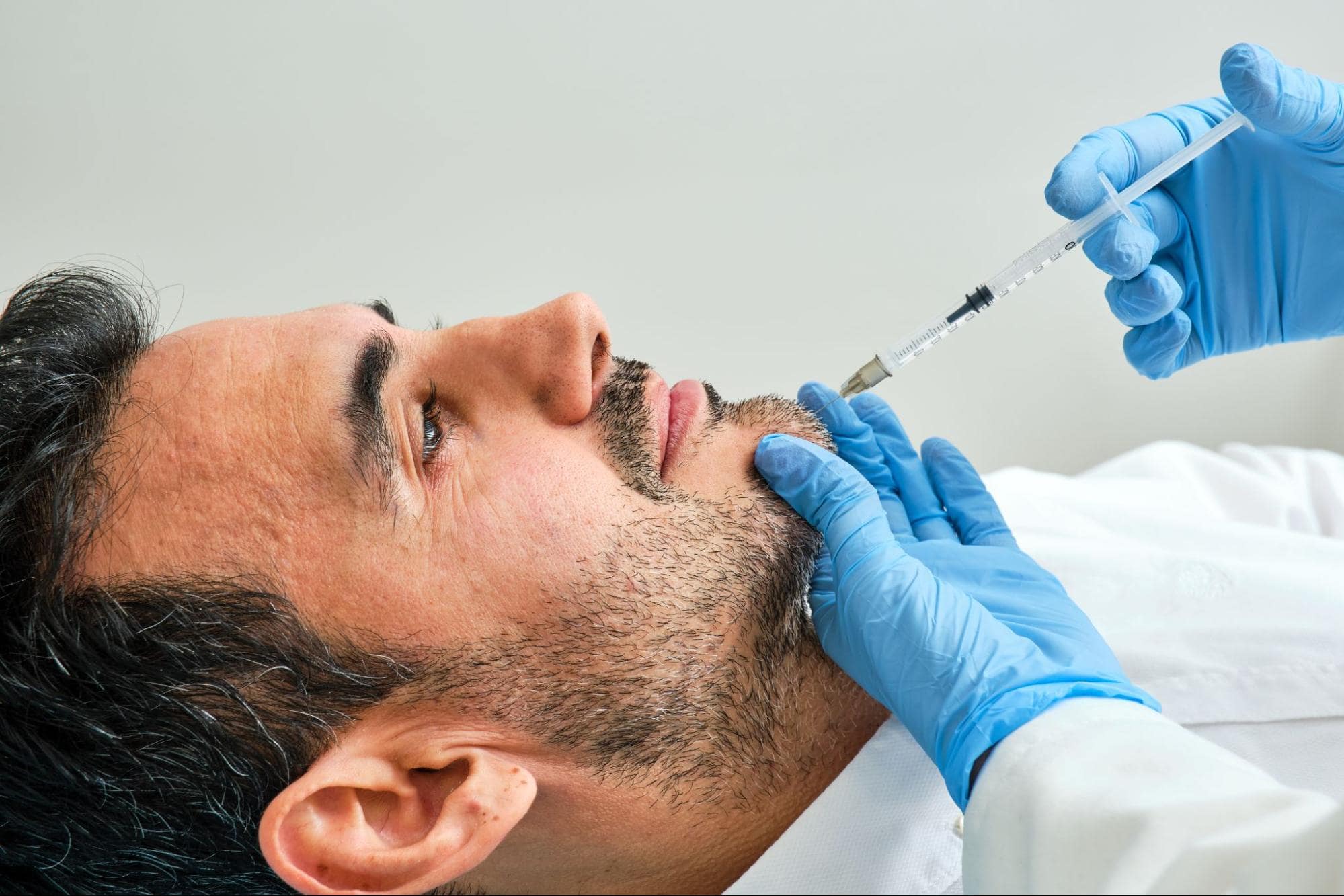 man getting injectable fillers