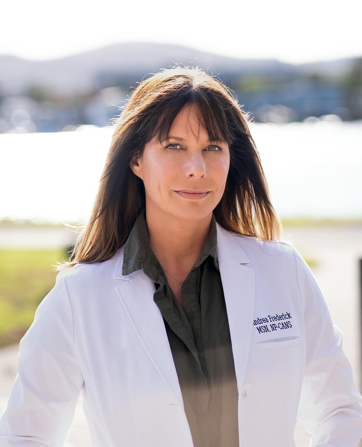 female in lab coat Andrea Frederick