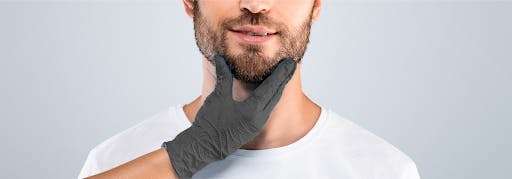 half of mans face with beard