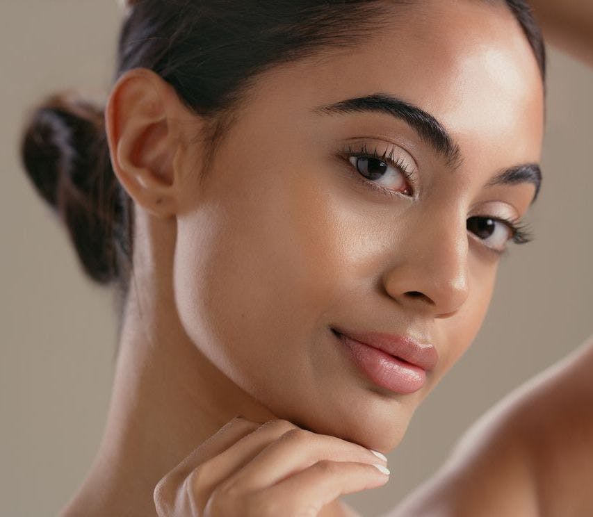 Close up of a beautiful face gazing peacefully at the camera