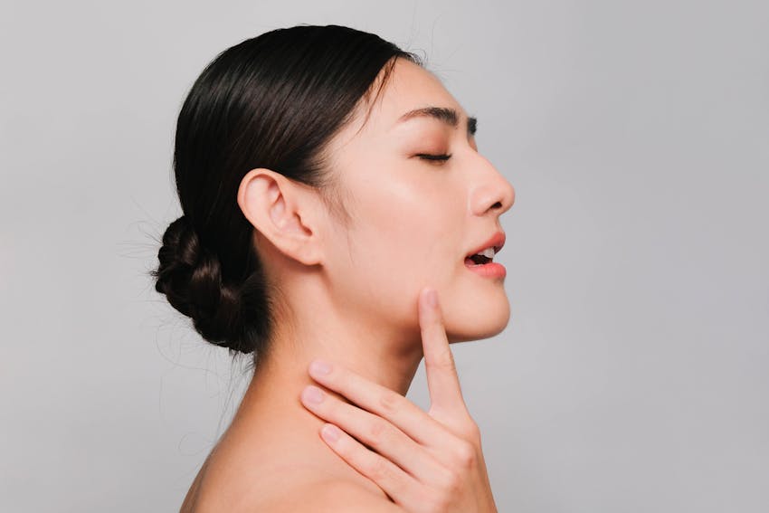 young beautiful asian woman with clean and bright skin