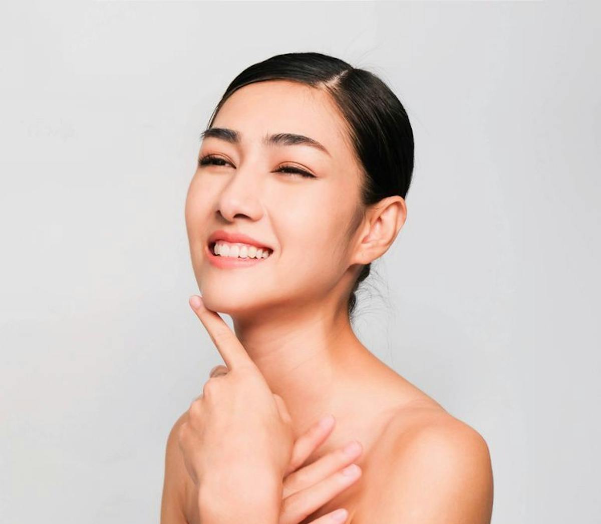 Beautiful Woman Smiling and has prefect skin