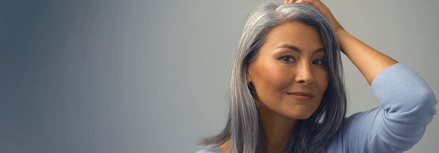 youthful middle aged female of Asian ethnicity, a model for nonsurgical facelift results