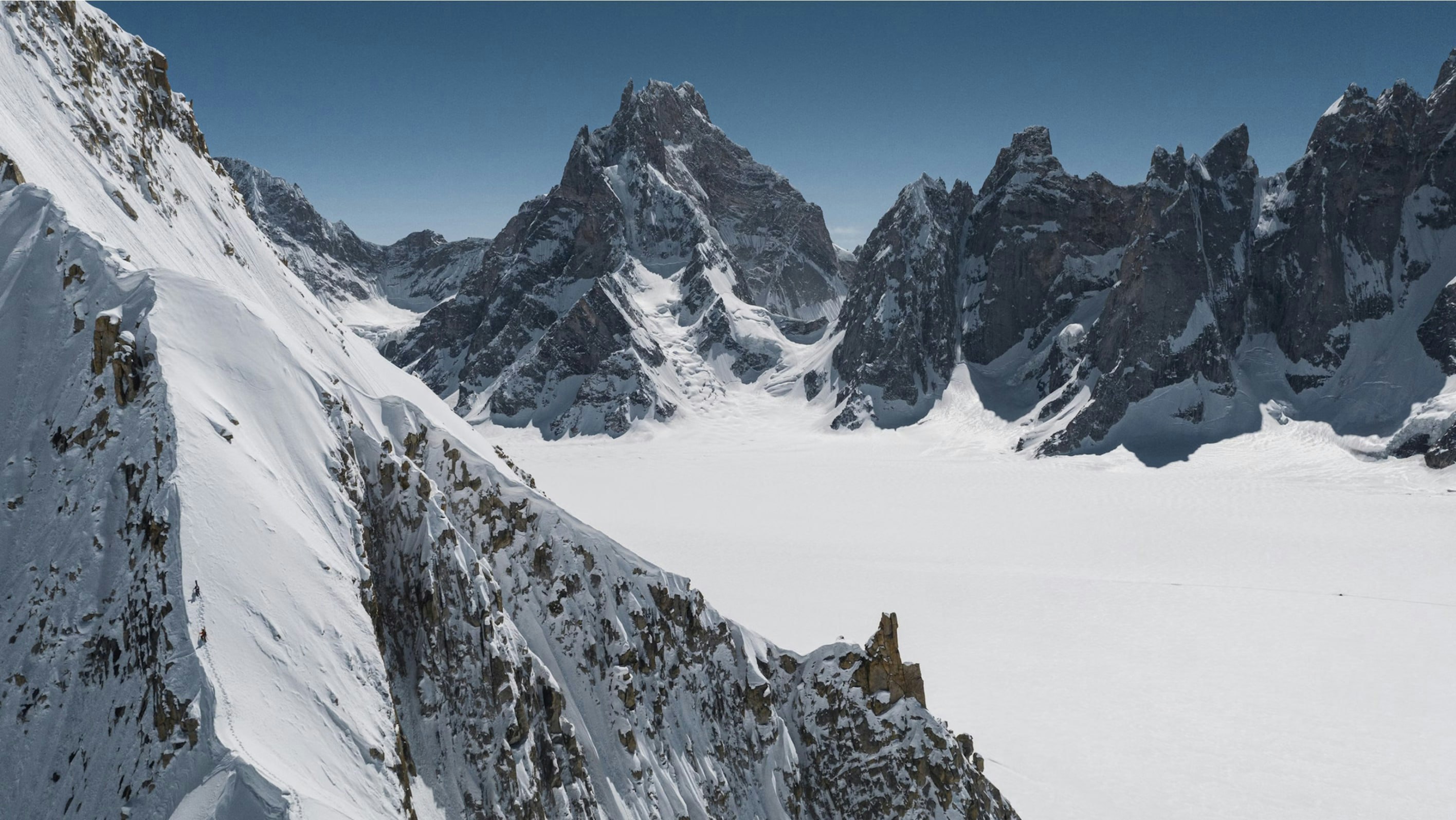 A snowy mountain panorama.