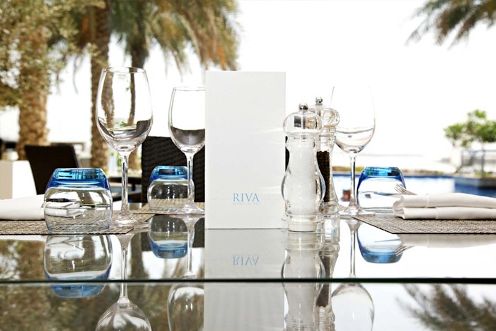 RIVA Ristorante, RIVA Beach Club Elegant table setup , ready for a refreshing dining experience