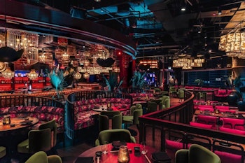 Colorful and luxurious interior with dim lighting and eclectic decor.