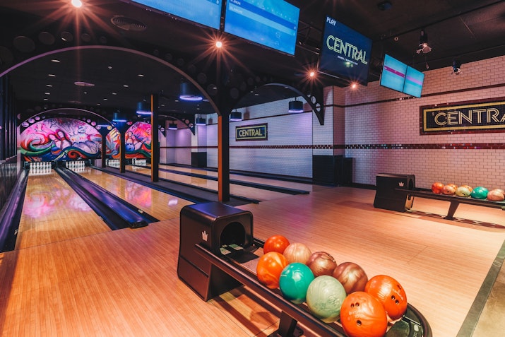 Colourful bowling area with unique wall artworks