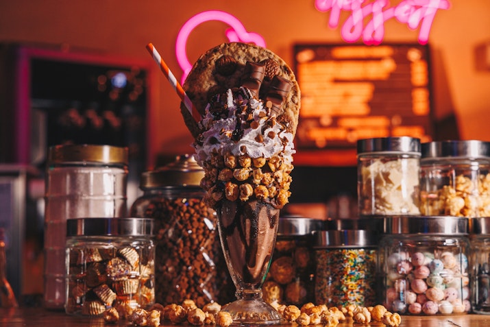 Assortment of decadent desserts, from cakes to sundaes, for a sweet finish.