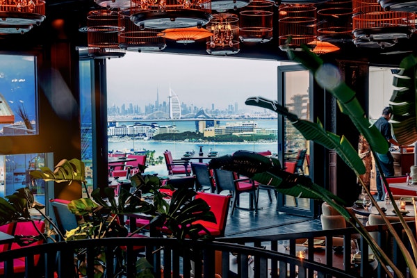 Restaurant with cityscape view and modern decor