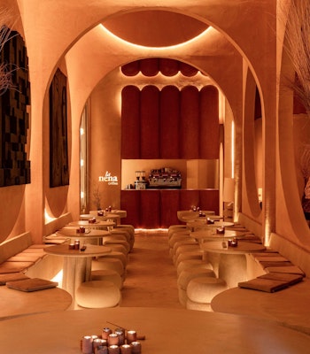 La Nena Cafe Immerse yourself in the warm, earthy tones of this unique dining space.