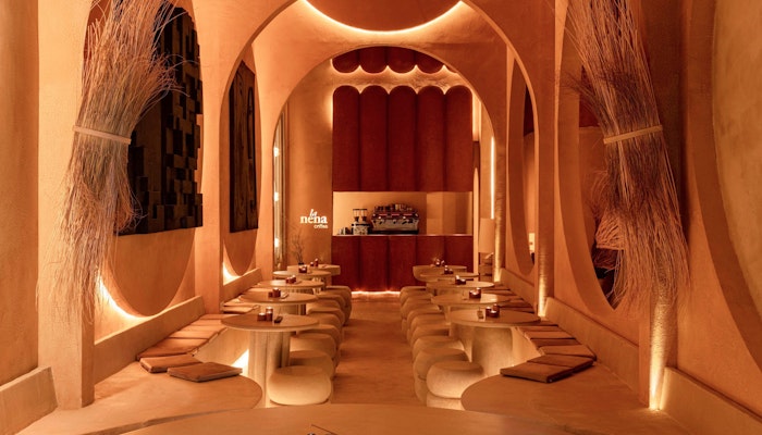 La Nena Cafe Immerse yourself in the warm, earthy tones of this unique dining space.