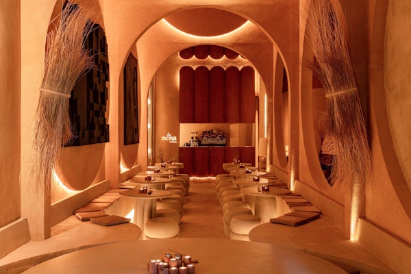 Immerse yourself in the warm, earthy tones of this unique dining space.