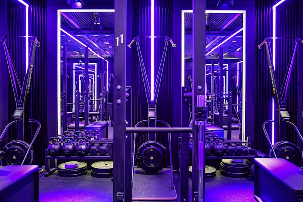 Drop10 Fitness space with neon lighting and functional fitness equipment