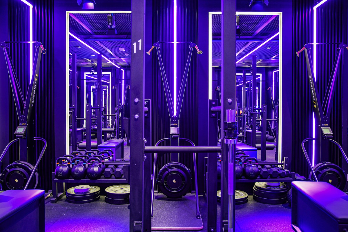 Drop10 Fitness space with neon lighting and functional fitness equipment