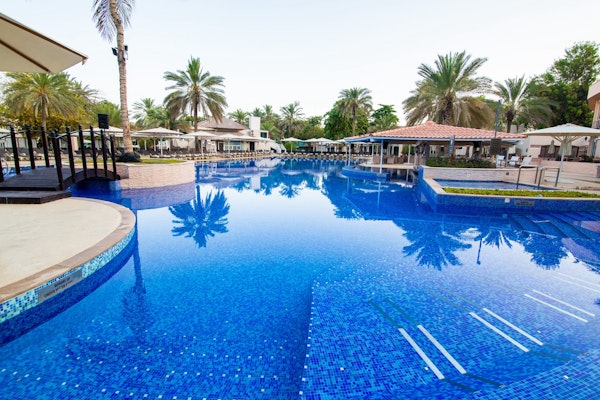 Enjoy a slice of paradise by the pool at Habtoor Grand Resort, Autograph Collection!