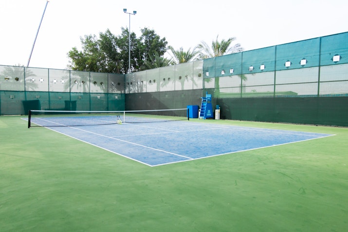 Unleash your competitive spirit with free access to Tennis and Squash Courts at Habtoor Grand Resort!
