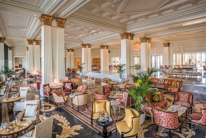 Mosaico at Palazzo Versace provides a luxurious setting. Opulent interior with elegant seating and classic decor.