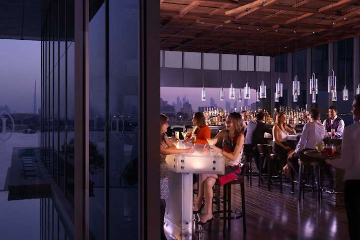 Restaurant with city views and ambient lighting