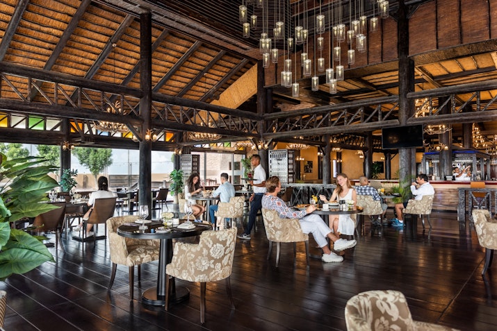 Rustic-style restaurant with wooden decor and seated patrons