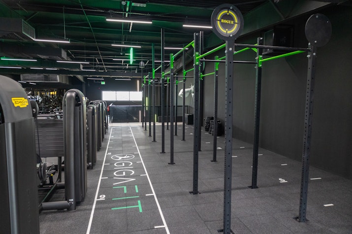 Functional training area equipped with functional equipment like kettlebells, resistance bands, and battle ropes.