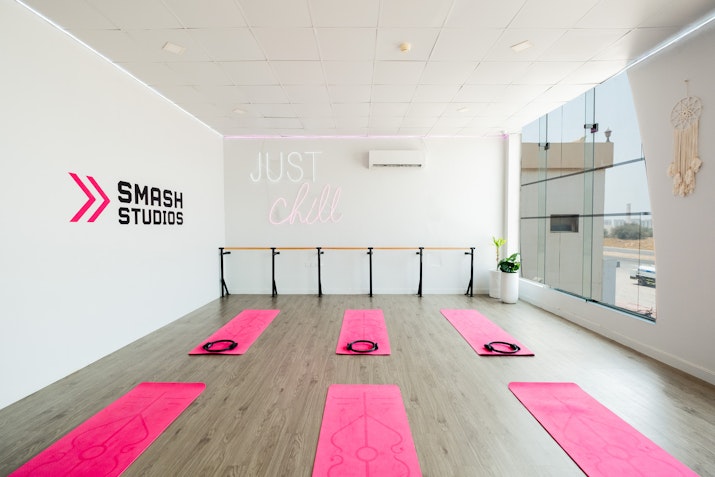 Two specialized fitness studios equipped for diverse workouts and training sessions.