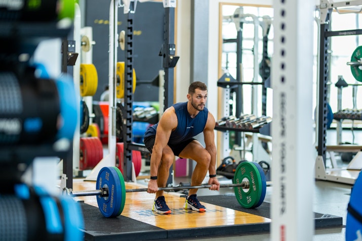High-end gym facilities at Wellfit Meydan, featuring advanced equipment and spacious workout areas.
