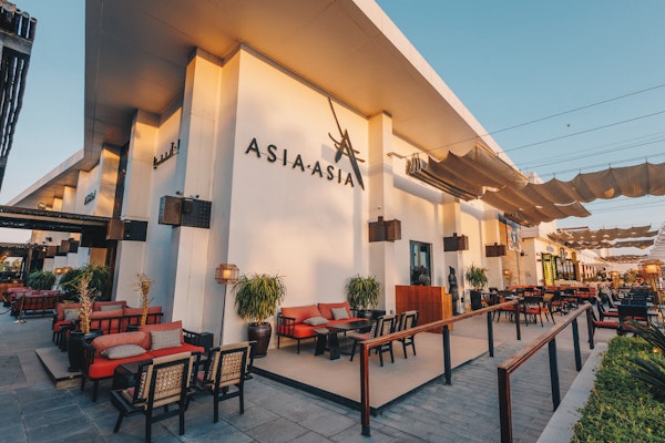 Luxurious dining ambiance, featuring exquisite pan-Asian dishes and elegant decor.