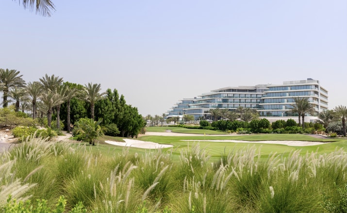 JA Lake View Luxury resort view across landscaped gardens and golf course.