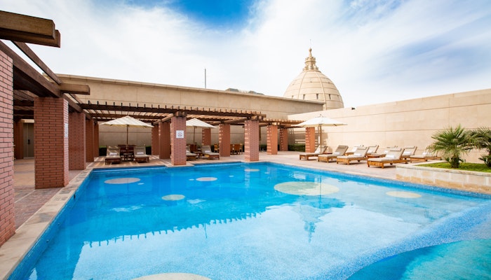 Hilton Al Habtoor City Swiming pool with blue skys