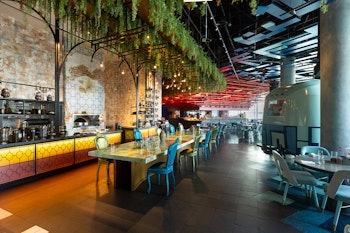 Spacious dining area with greenery