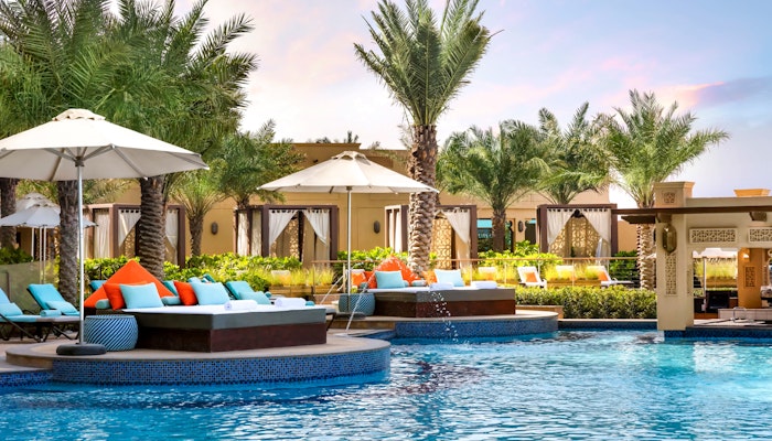 Fairmont Ajman Pool with palm views