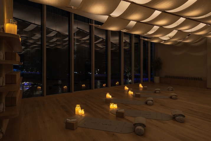 Yoga matts on the floor at night