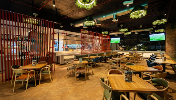 Jamjars Industrial restaurant with plant based lighting