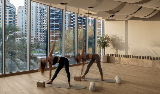Women performing yoga