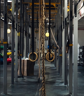 Arena Fitness Gym rack area with hoops and ropes