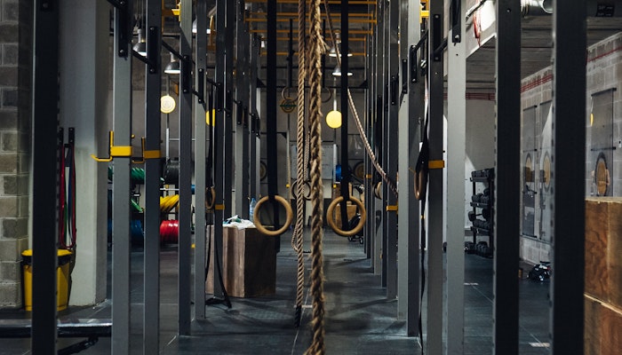 Arena Fitness Gym rack area with hoops and ropes