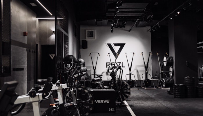 REVL Downtown Open gym area with industrial feel
