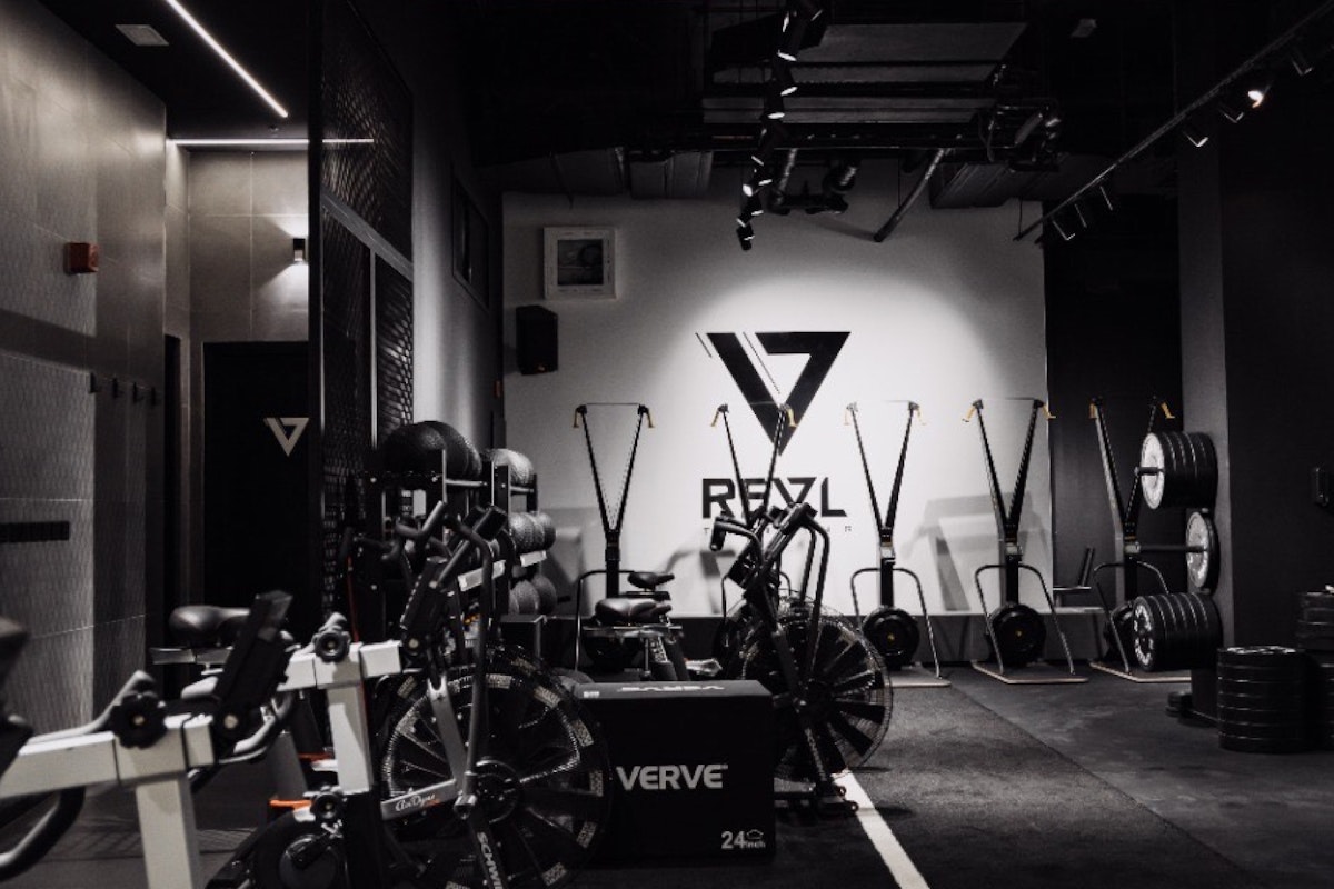 REVL Downtown Open gym area with industrial feel