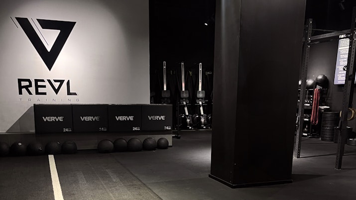 REVL Downtown Open gym area with industrial feel