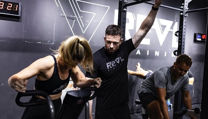 REVL Downtown People working out in a fitness class