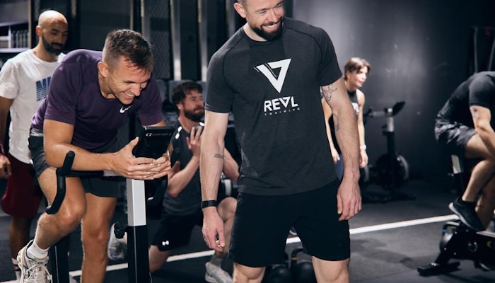 REVL Downtown People working out in a fitness class
