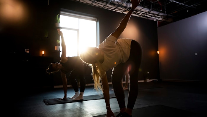 Two females in a pilates class