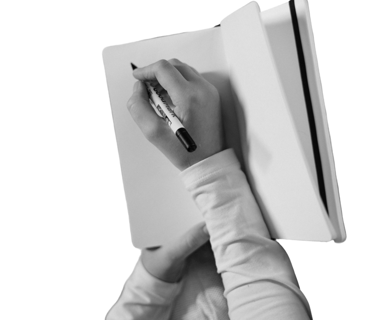 Writing in notebook