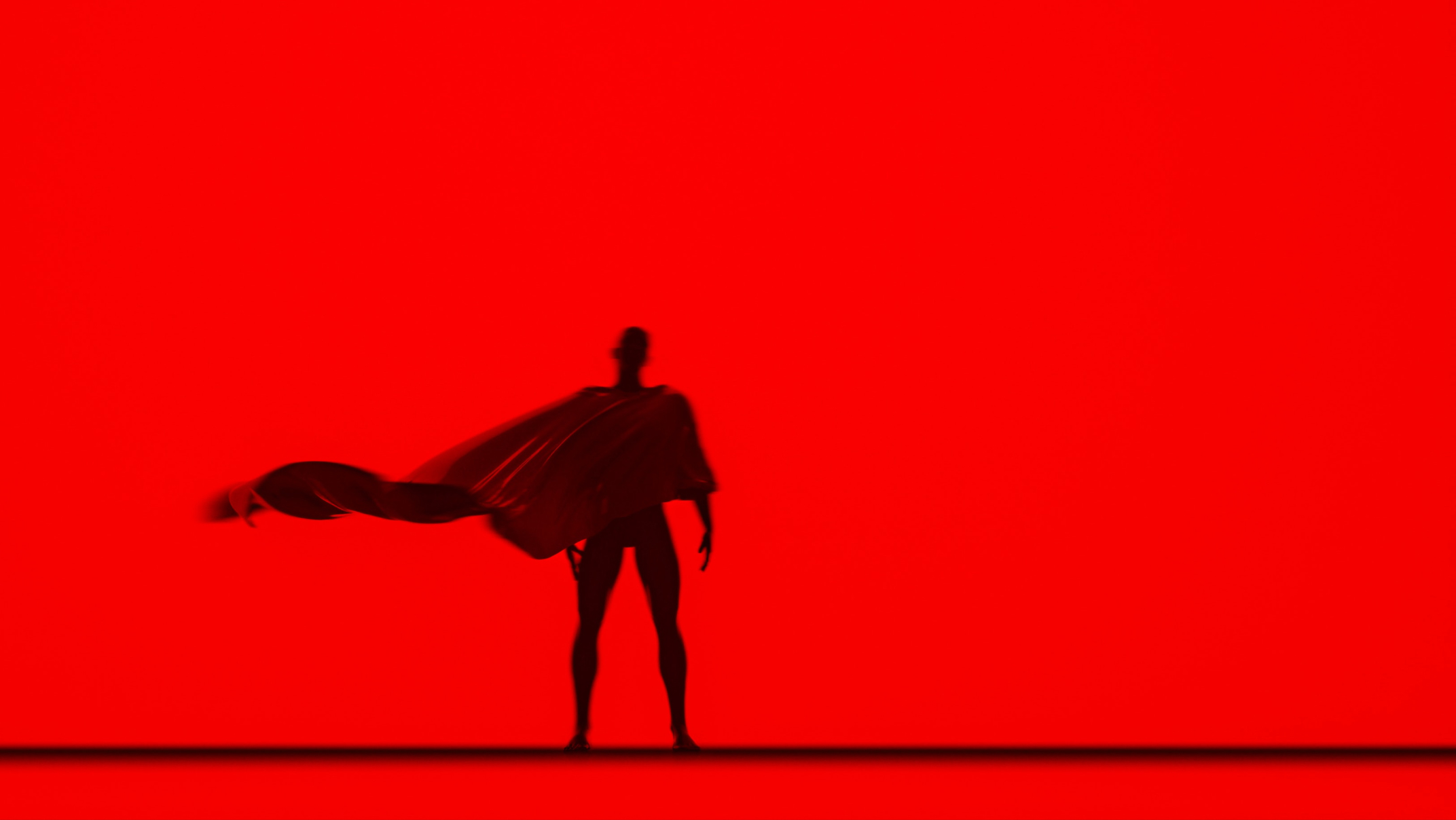 Superman on a red background