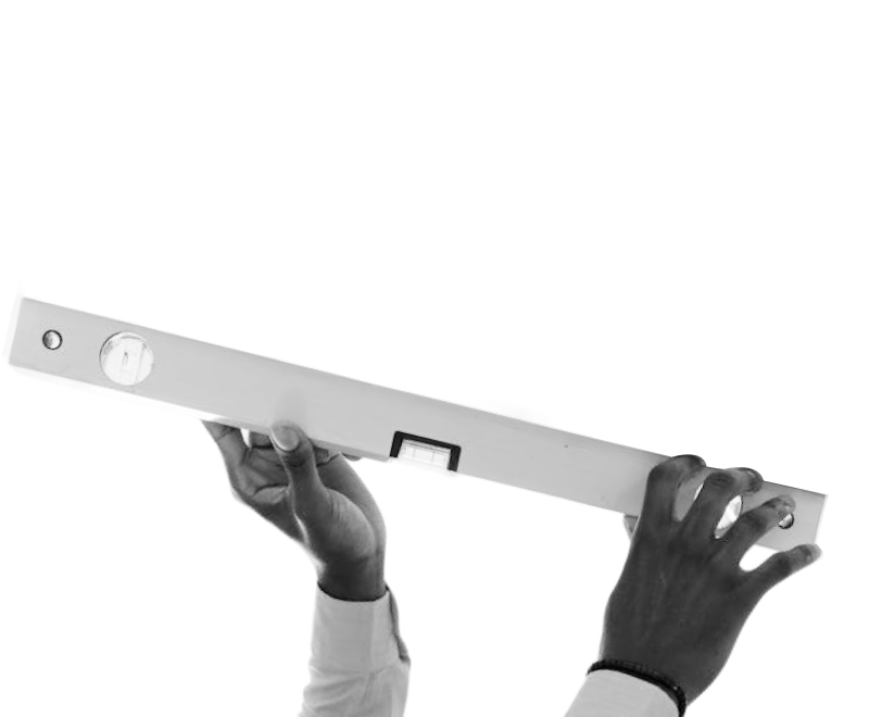 Hands holding a spirit level