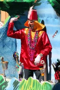 image of a man in a red outfit throwing something