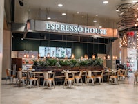 Butiksfasad Espresso House gatuplan Femman