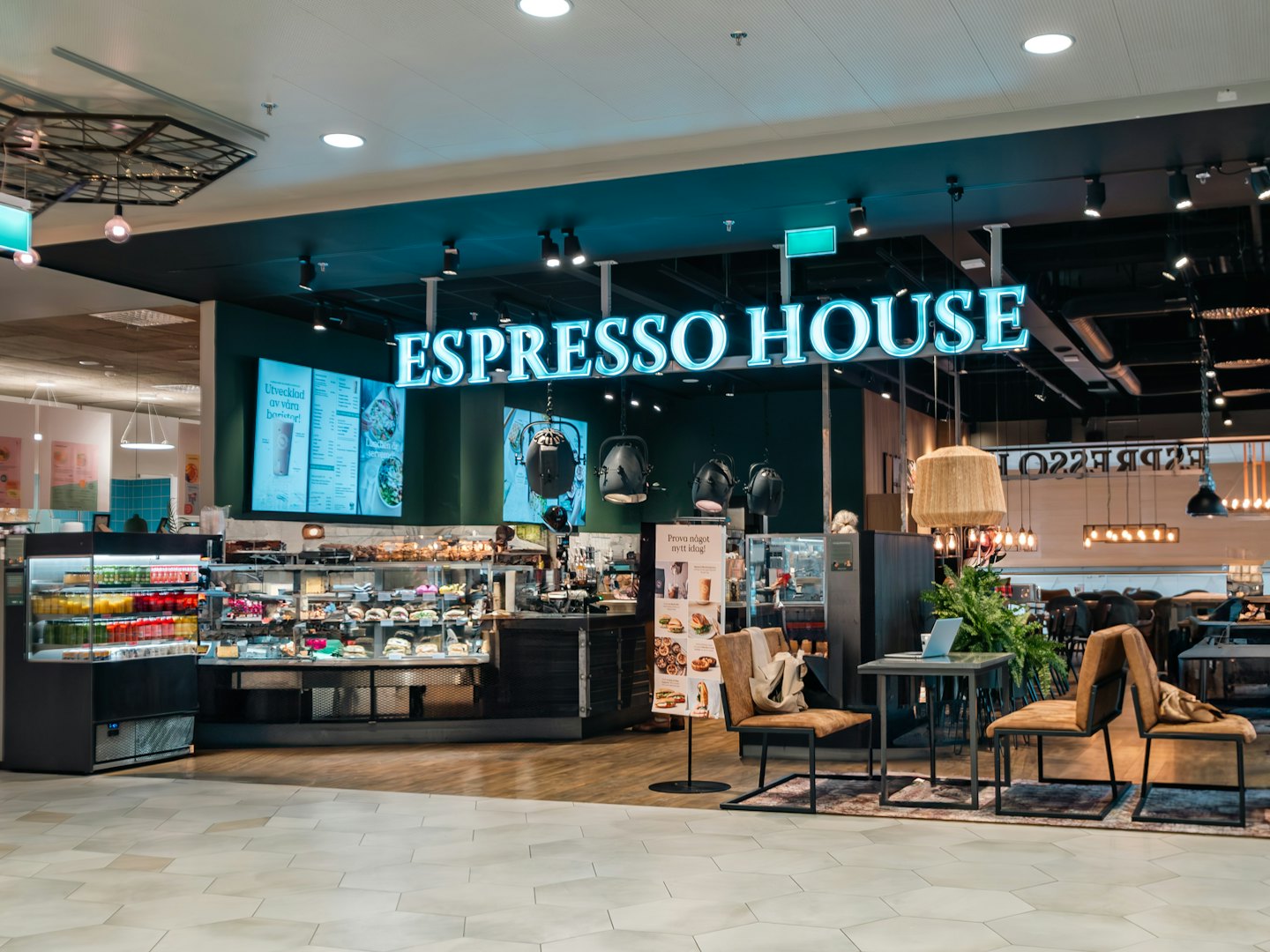 Logotyp Espresso House Femman övre plan